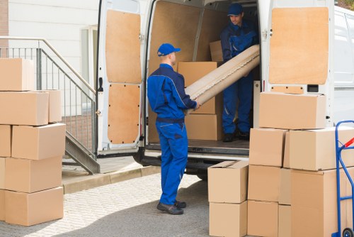 Man with van loading furniture in Blackheath near local homes