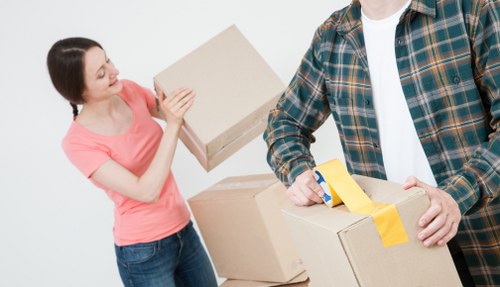 Packing and loading furniture into a removals van