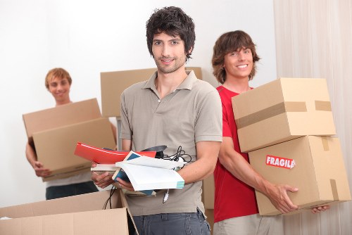 Packed office boxes and equipment ready for relocation