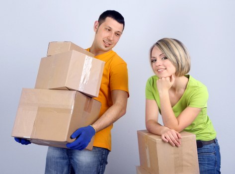 Mover handling belongings carefully during a van service
